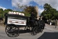 Four-horse cortège brings town to a halt