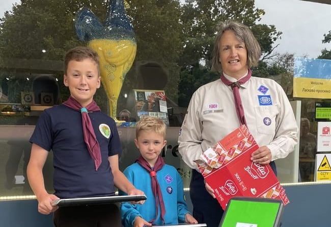 Fernhurst Group Scout leader Sue Gibbon with Beaver Jack Penfold and Scout Stuart Bradley