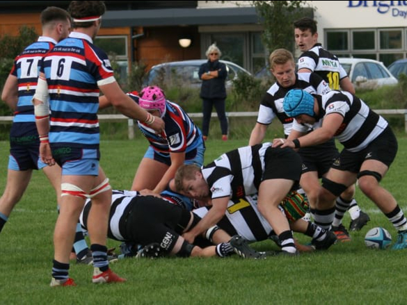 Ben Brown secures possession with Jonny Vincent as Ollie Brown darts in to recycle the ball