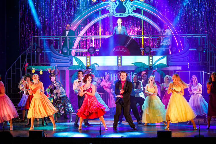 The Grease cast performing Born to Hand Jive