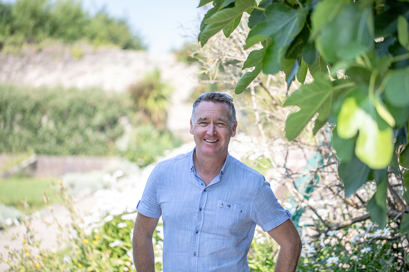 TV presenter Chris Jones will lead members of the public on walks to celebrate 10 years of the Wales Coast Path