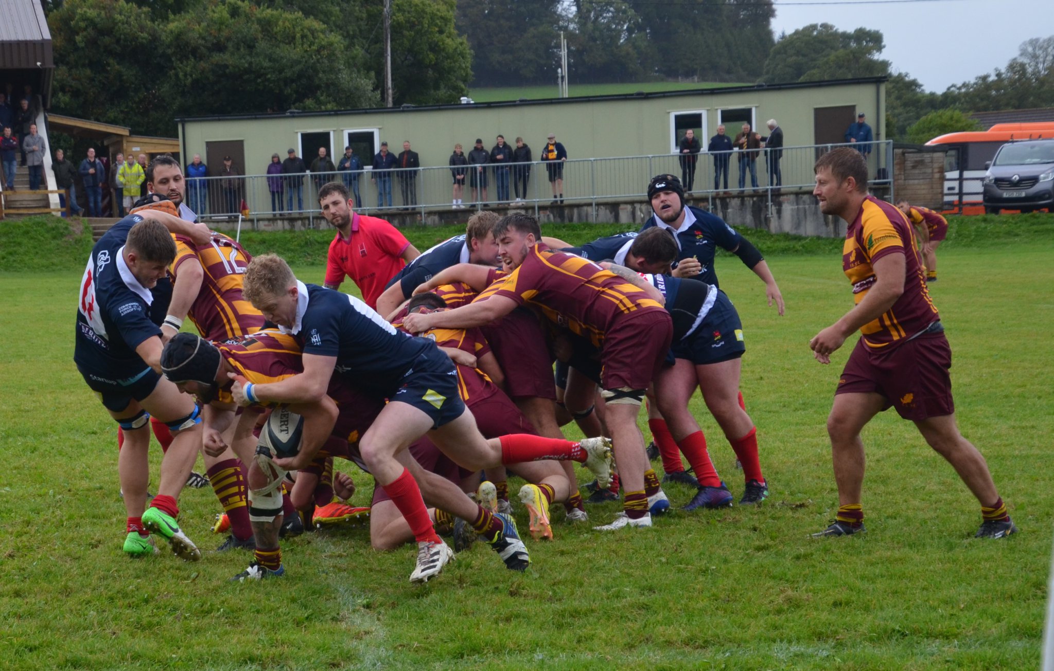 Above and right, Okehampton first XV endured a tough day at the office in poor conditions but their grit and determination pleased captain Dan Fogerty