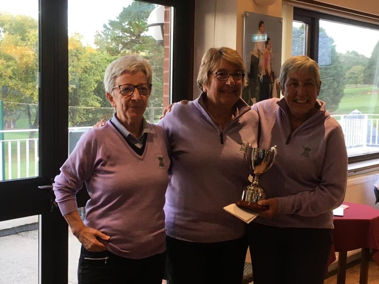 Above, the victorious presidents team; below left, the ladies’ bowmaker team of Elaine Marwood, Di Johnson and Maggie Caws; below right, Warren Crocus pair Lorna Evans (left) and Mary Keir (right) with Dawlish’s lady captain (middle)