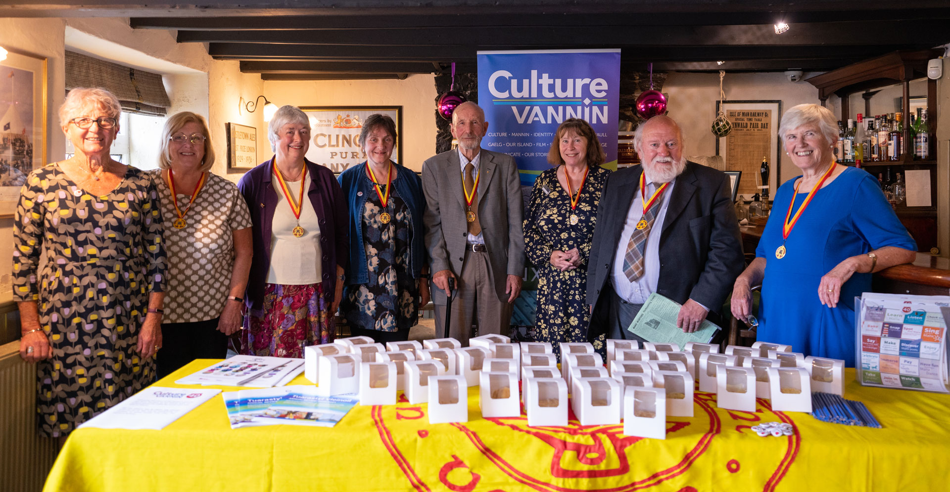 Previous winners of the RBV award, Win Callister and Anne Corlette of The Michael Players; Joan Cowell of Manx Folk Dance Society; Julie Matthews of Bunscoill Ghaelgagh; Frank Cowin; Clare Kilgallon; Peter Kelly and Dr. Fenella Bazin.