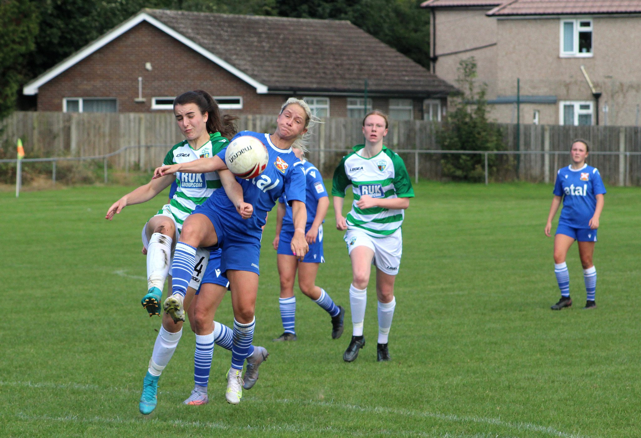 Double goalscorer Ellis Lunn goes close again, left, while Pennies’ captain Ceri Hudson drives forward. Photos: Andrew Kennedy.
