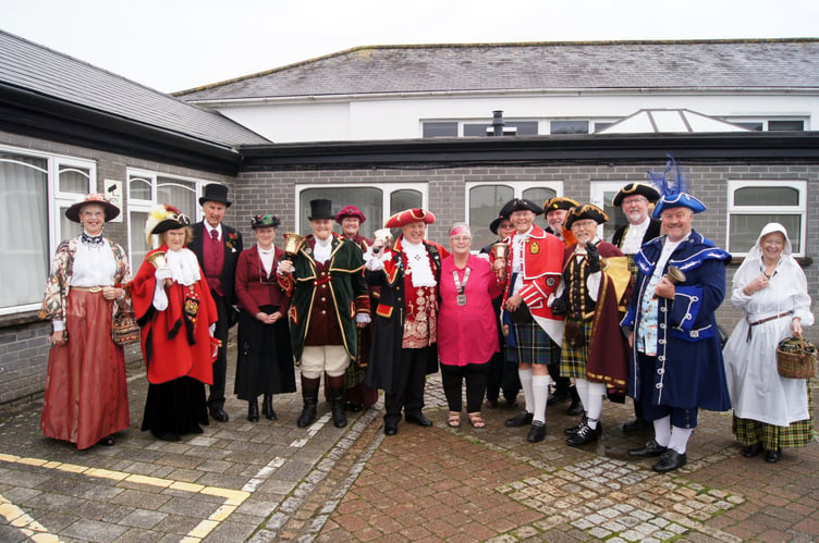 TOWN Criers and their consorts representing Callington, Launceston, Liskeard, Torpoint, Tavistock, Plymouth, Dartmouth, Dawlish, Newton Abbott and Hatherleigh Manor pictured with deputy portreeve of Callington Suz Tolman