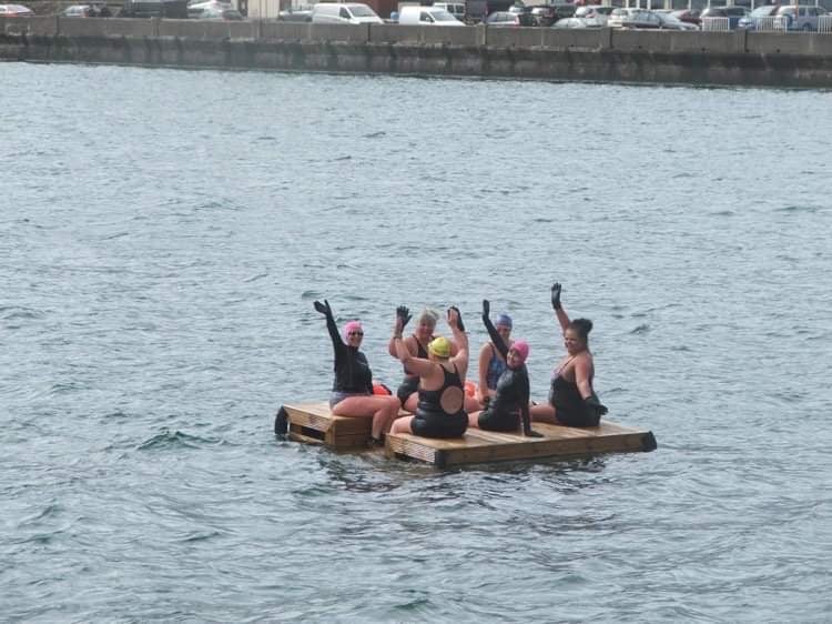 The sea swimming group praised exisiting Ramsey beach amenties like a floating raft but are hoping a permanent changing shelter can be built
