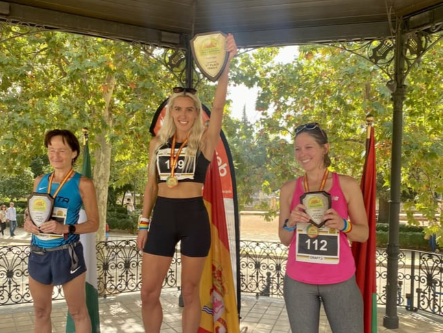 Christa Cain on the top step of the podium in Granada City, Andalucia on Saturday after winning the women’s class (and finishing second overall) in what is known as the World’s Fastest Marathon, because it descends more than 6,000ft through the Sierra Nevada Mountains in Spain