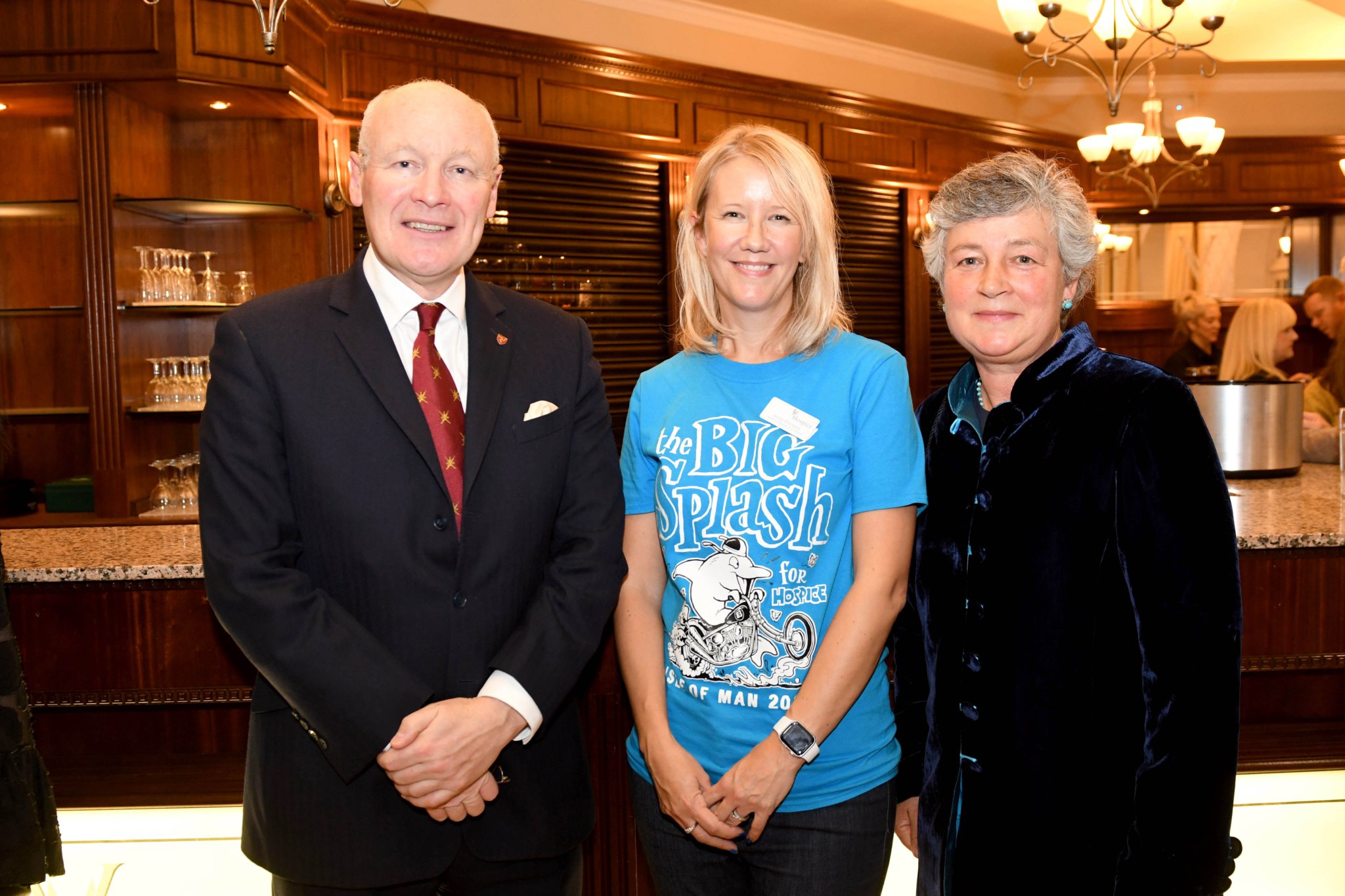 The final auction event for the ‘Big Splash’ campaign, raising money for Hospice Isle of Man - Lieutenant Governor Sir John Lorimer and Lady Philippa Lorimer with Anne Shorrock of Hospice Isle of Man (centre)