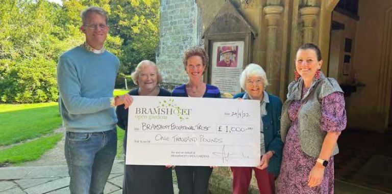 <p>Bramshott Open Gardens presents a cheque for £1,000 to the Bramshott Educational Trust</p>