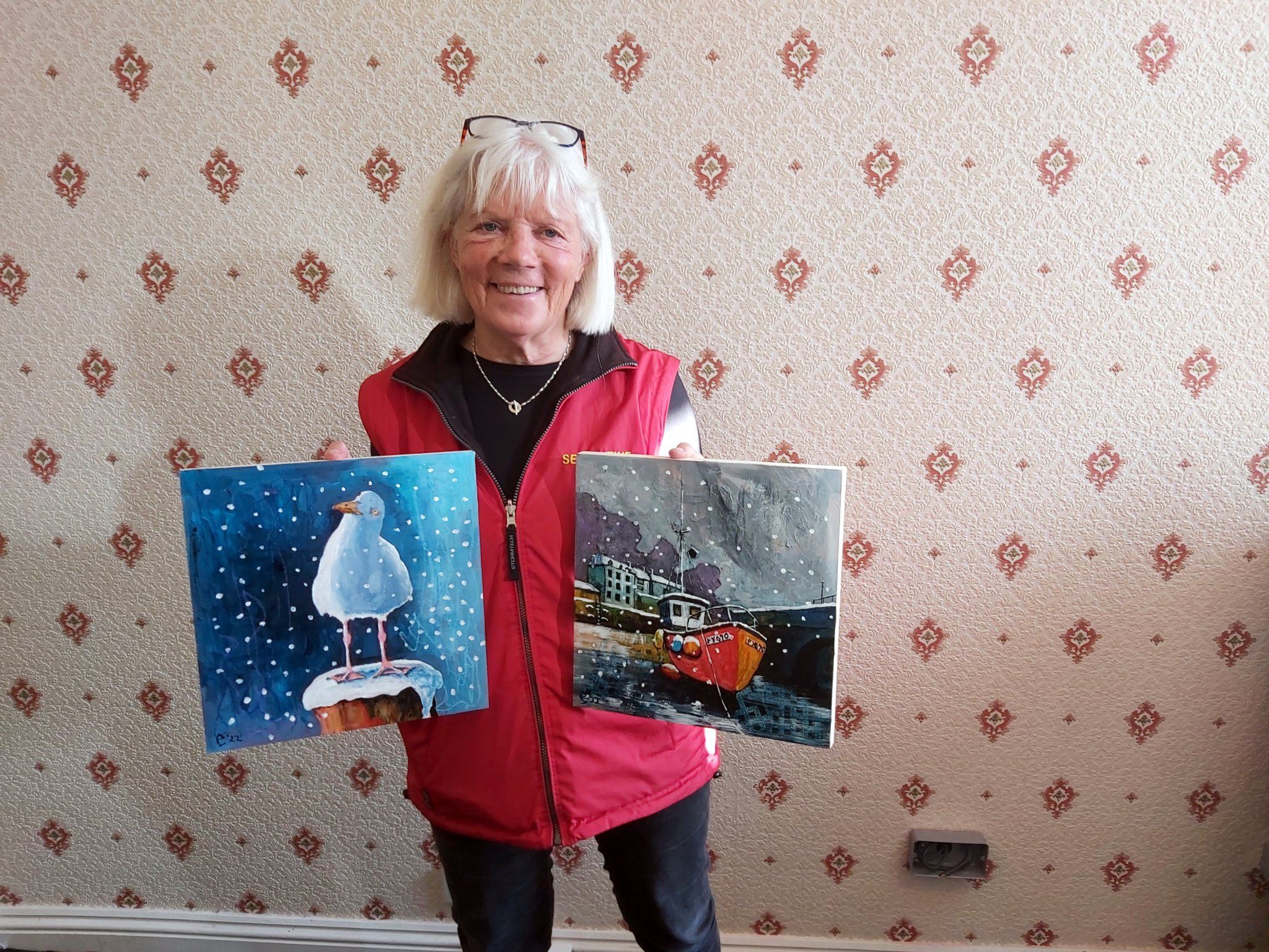 Ann Kinahan with her Christmas cards and paintings