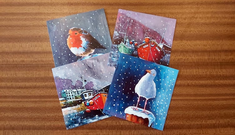Ann Kinahan with her Christmas cards and paintings
