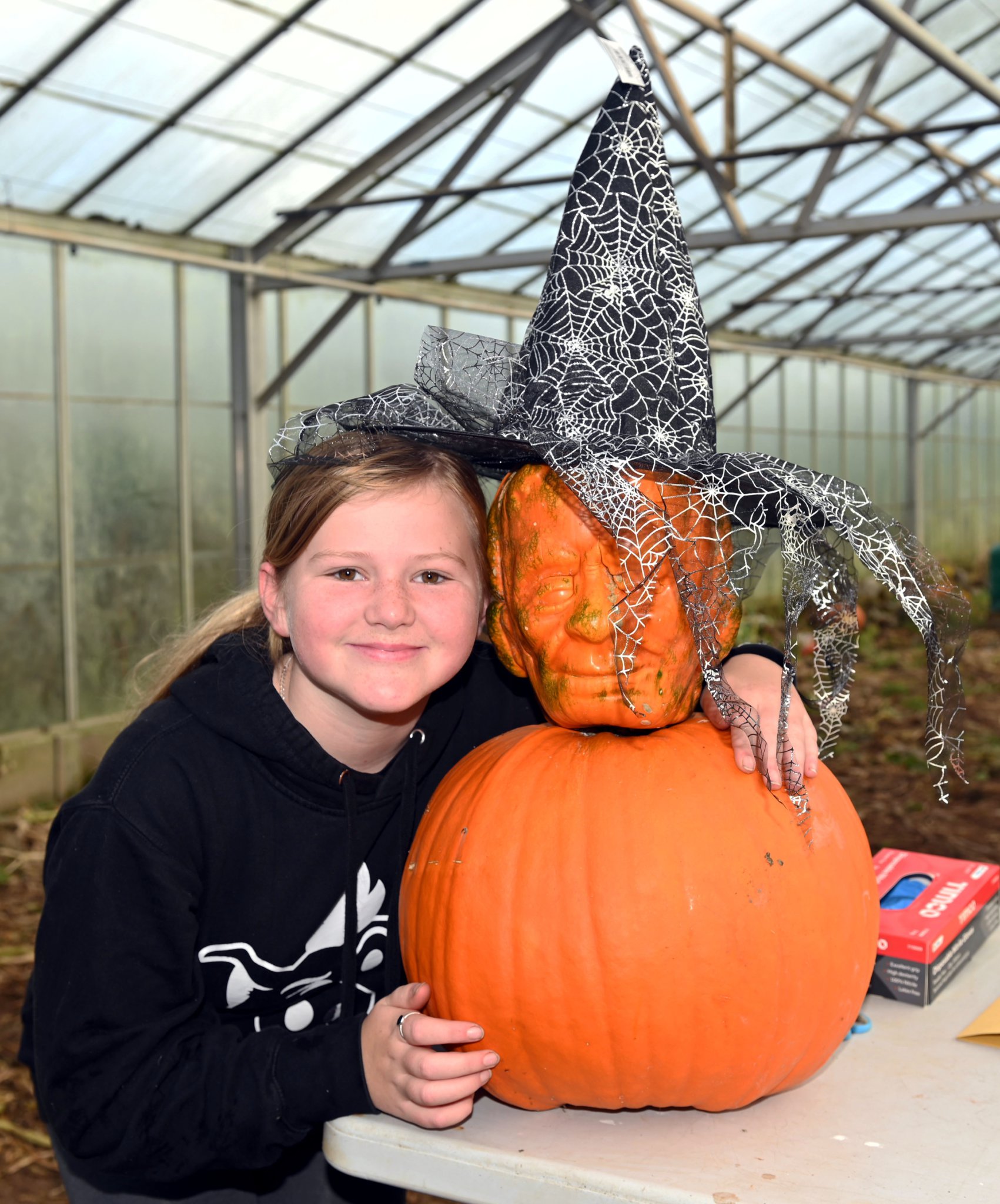 Pictured around their pumpkins are Sharon, Mark and Ruby (also pictured right) Orchard of Cedar Croft Nurseries in St Tudy. Pictures: Adrian Jasper