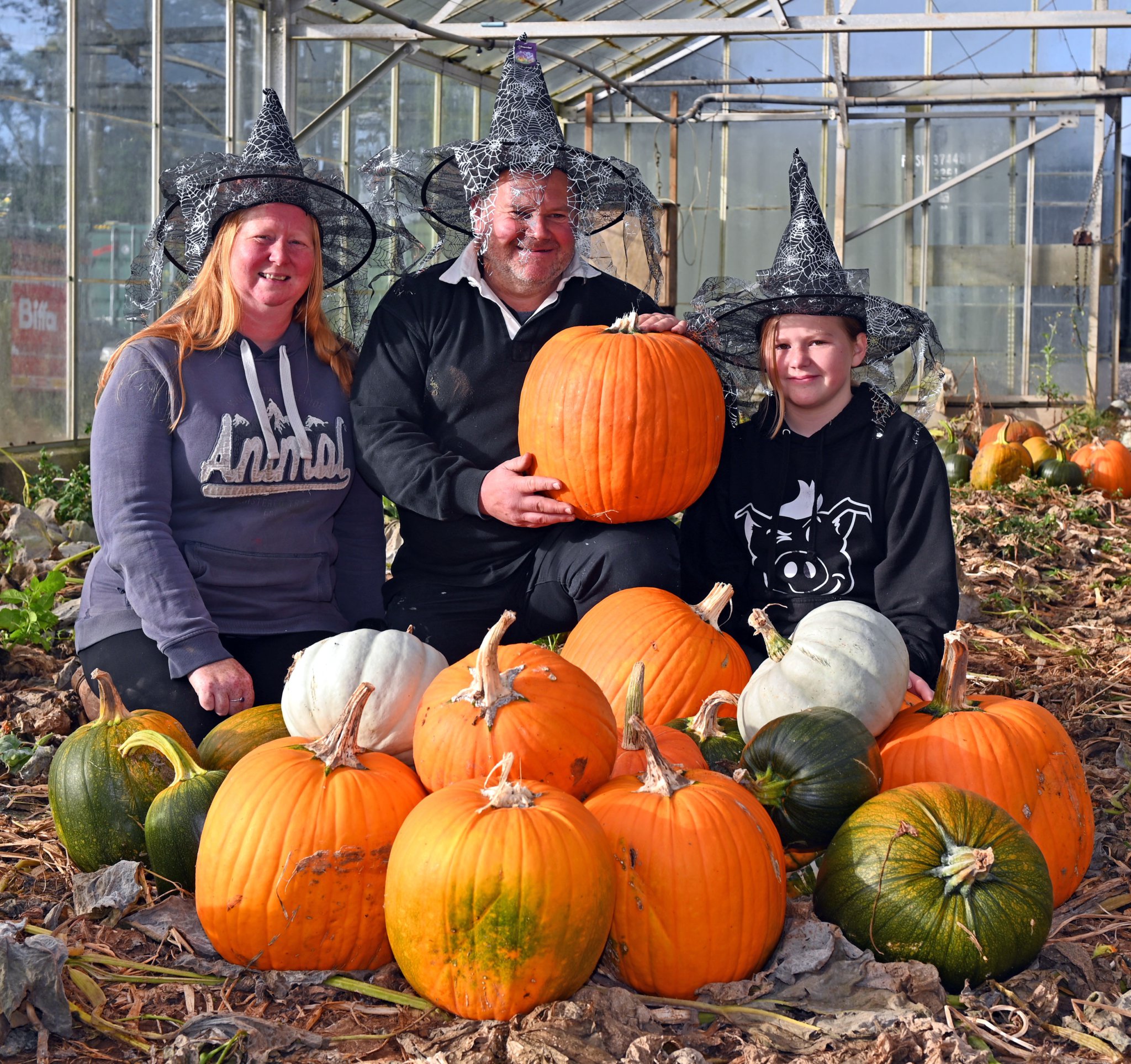 Pictured around their Pumpkins are Sharon. Mark and Ruby Orchard of Cedar Croft Nurseries St Tudy