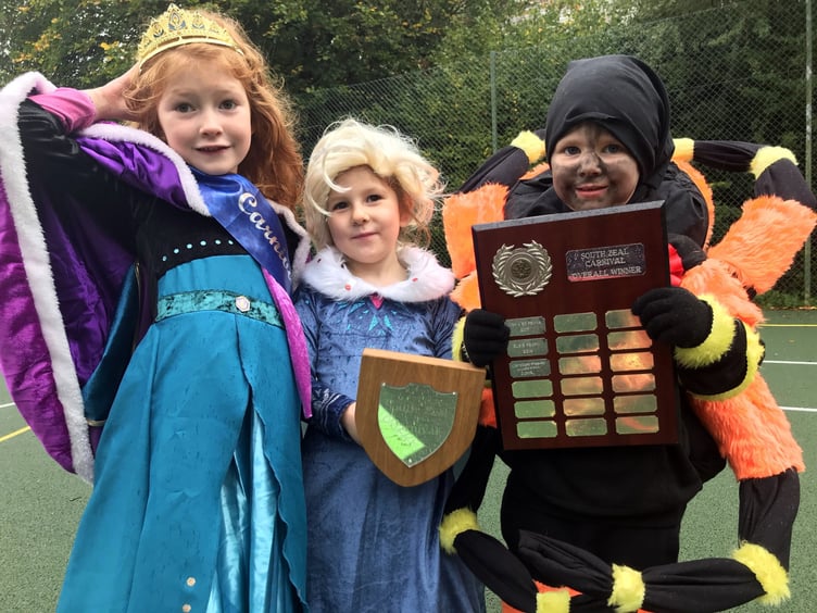 South Zeal Carnival
Princesses Hester and Bridget Parker-Bray and Louie Woodman, who won overall prize with his spider costume