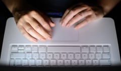 Fall in arrests for online abuse in Surrey