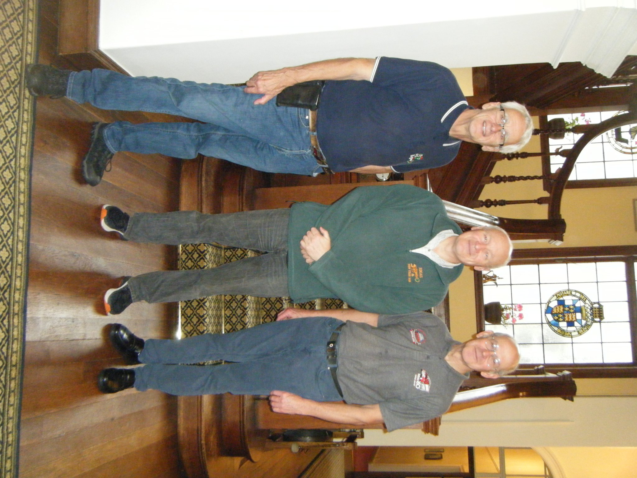 Organisers Ian Simms and John Tarrent joined the Governor after the classic Mini run