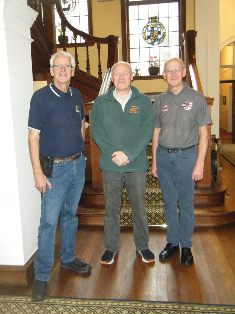 Organisers Ian Simms and John Tarrent joined the Governor after the classic Mini run