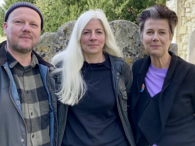F for Farnham creators Simon Aeppli, Sophie Austin and Roz Mortimer outside St Andrew’s Church