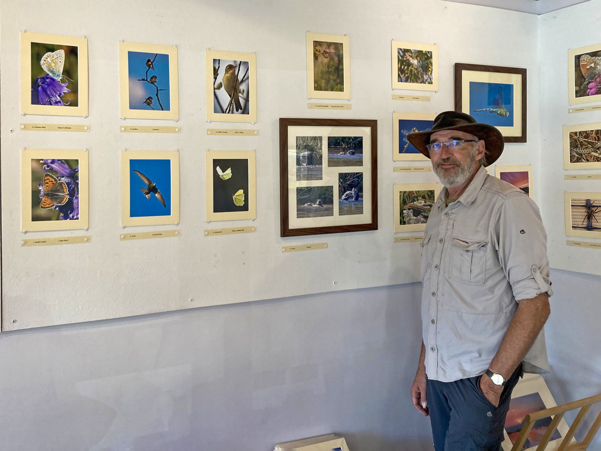 John Ibbotson at his exhibition, A Year on the Bog, and right, a few of the photographs featured