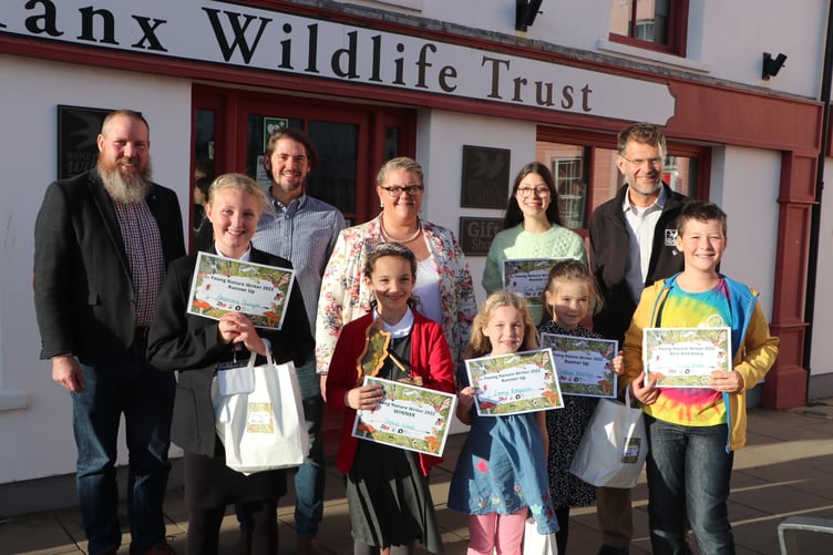 Winners and runners up of the Young Nature Writer 2022 competition with, from left, Graham Makepeace-Warne, engagement manager of Manx Wildlife Trust; Rob Fisher of the Manx Ornithological Society, Clare Barber MHK, vice-chair of UNESCO Biosphere Isle of Man, and Leigh Morris, chief executive of the Manx Wildlife Trust
