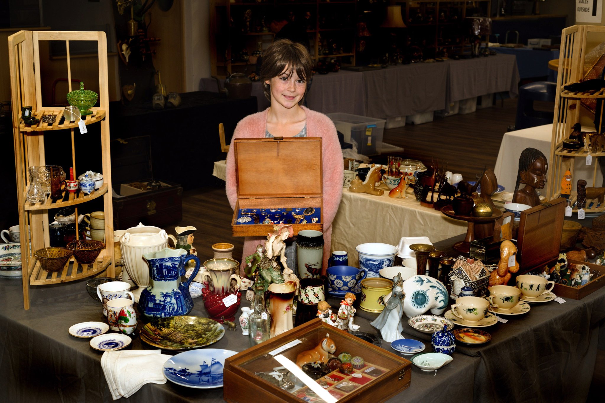 Faith, above, selling her antiques , and left, ready for her role in Immortium.
