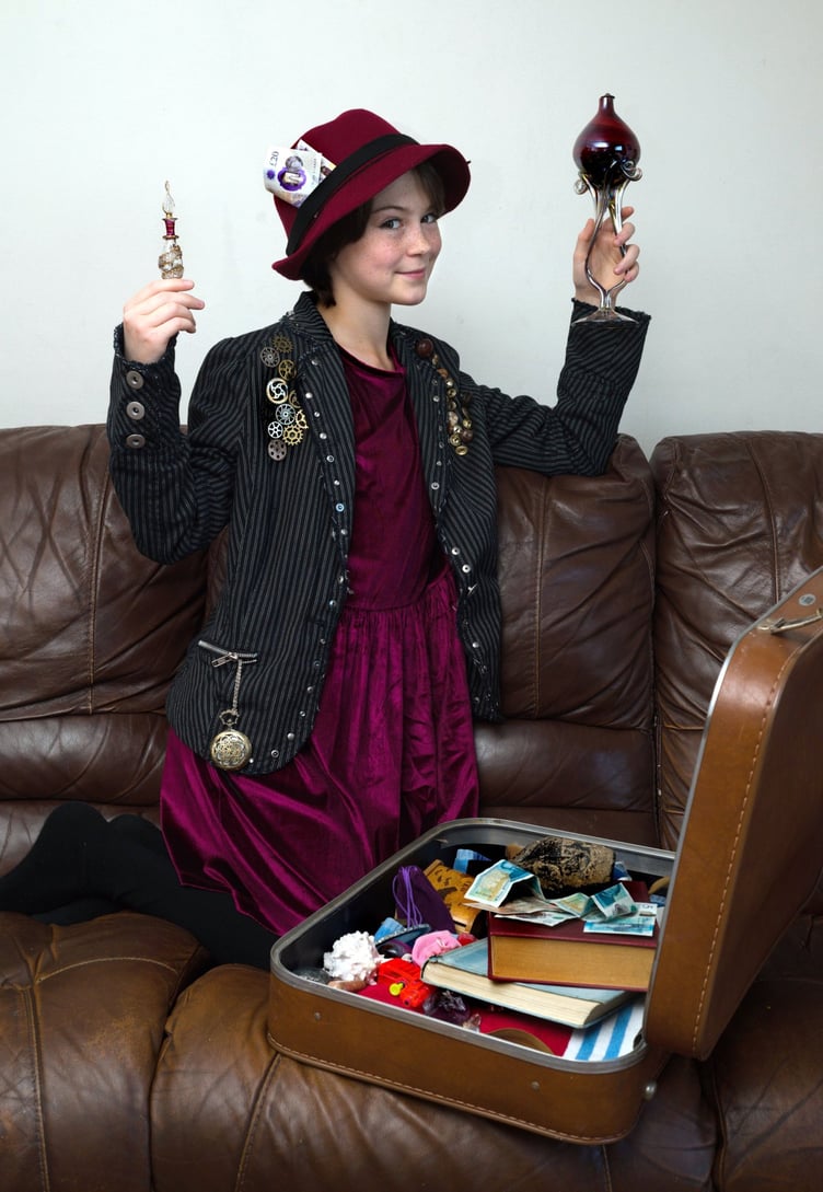 Faith, above, selling her antiques , and left, ready for her role in Immortium.