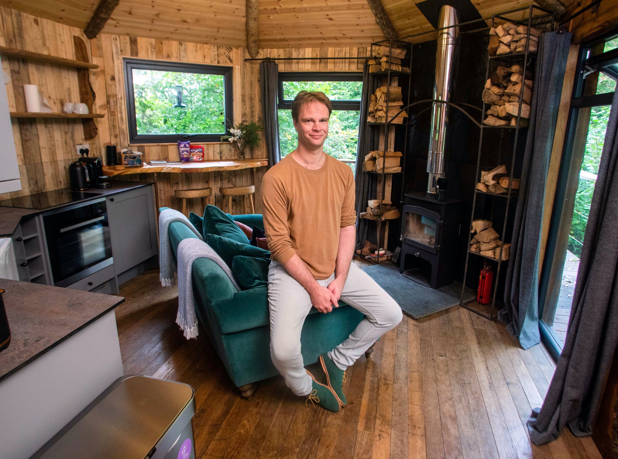 John Kitson, 42, of Looe in his treehouse