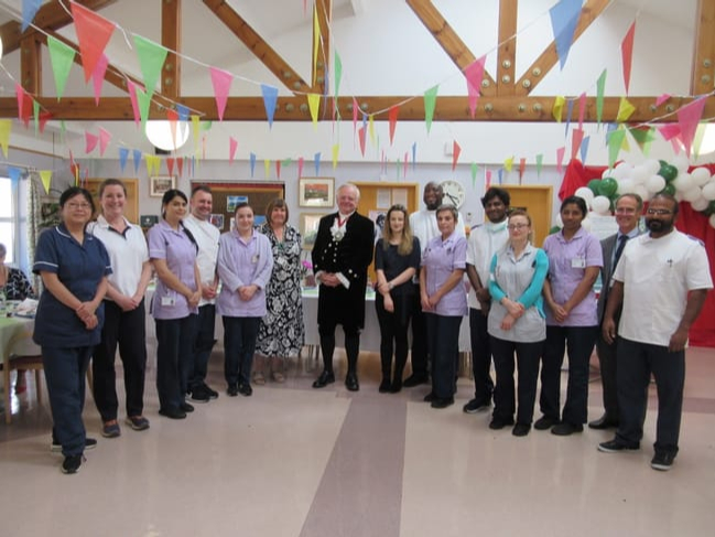 The High Sheriff of Surrey presented certificates and a gift to staff at Holy Cross Hospital