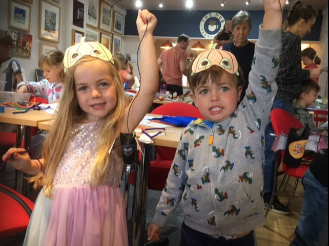 <p>Twins Violet and Arthur Berry show off their crafts at the Fernhurst Hub’s Hallowe’en event</p>