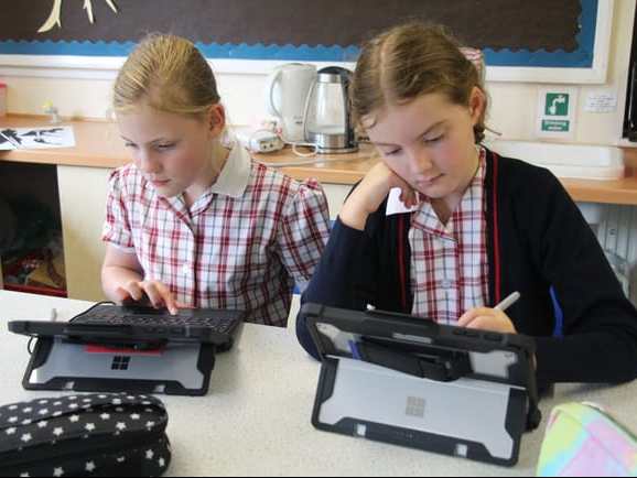 Royal School pupils using Surface Go tablets