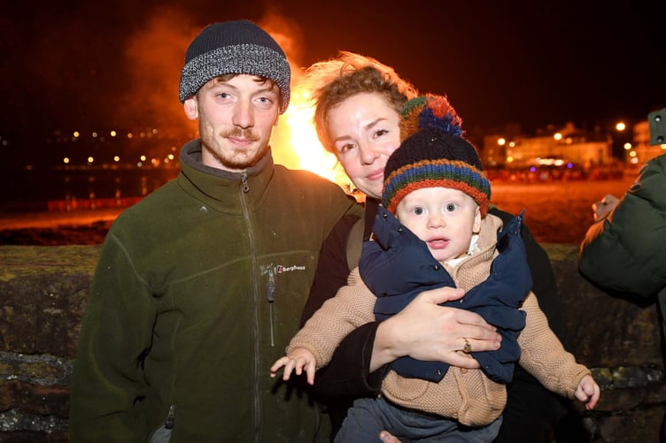 Peel Town Commissioners’ bonfire and fireworks - pictured is Dylan Hanna, Megan Hindley and Ronnie Hanna (11 months)
