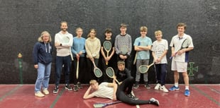 Haslemere Scouts try real tennis at Petworth House