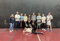Haslemere Scouts try real tennis at Petworth House