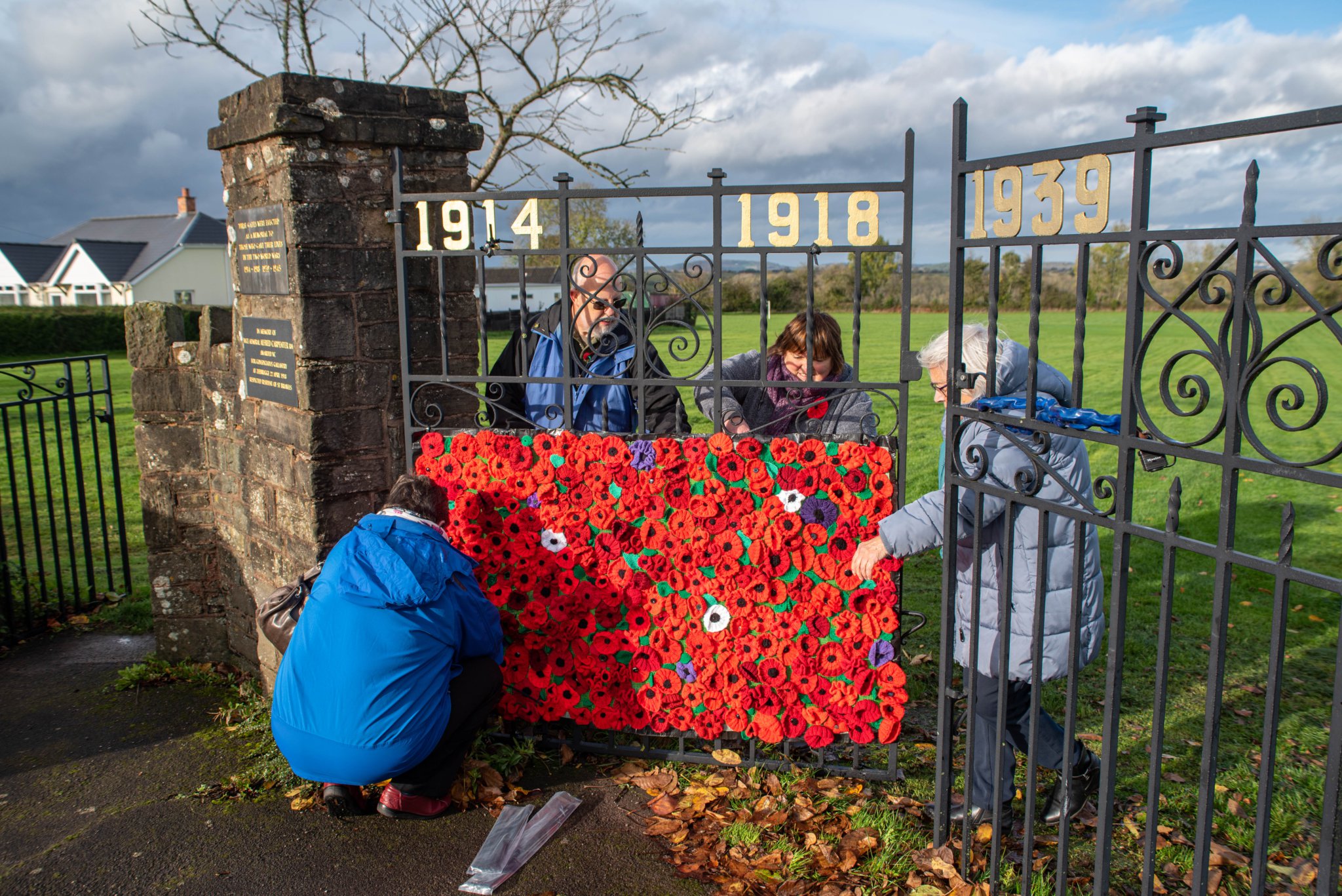 The poppies are put in place to form this beautiful display