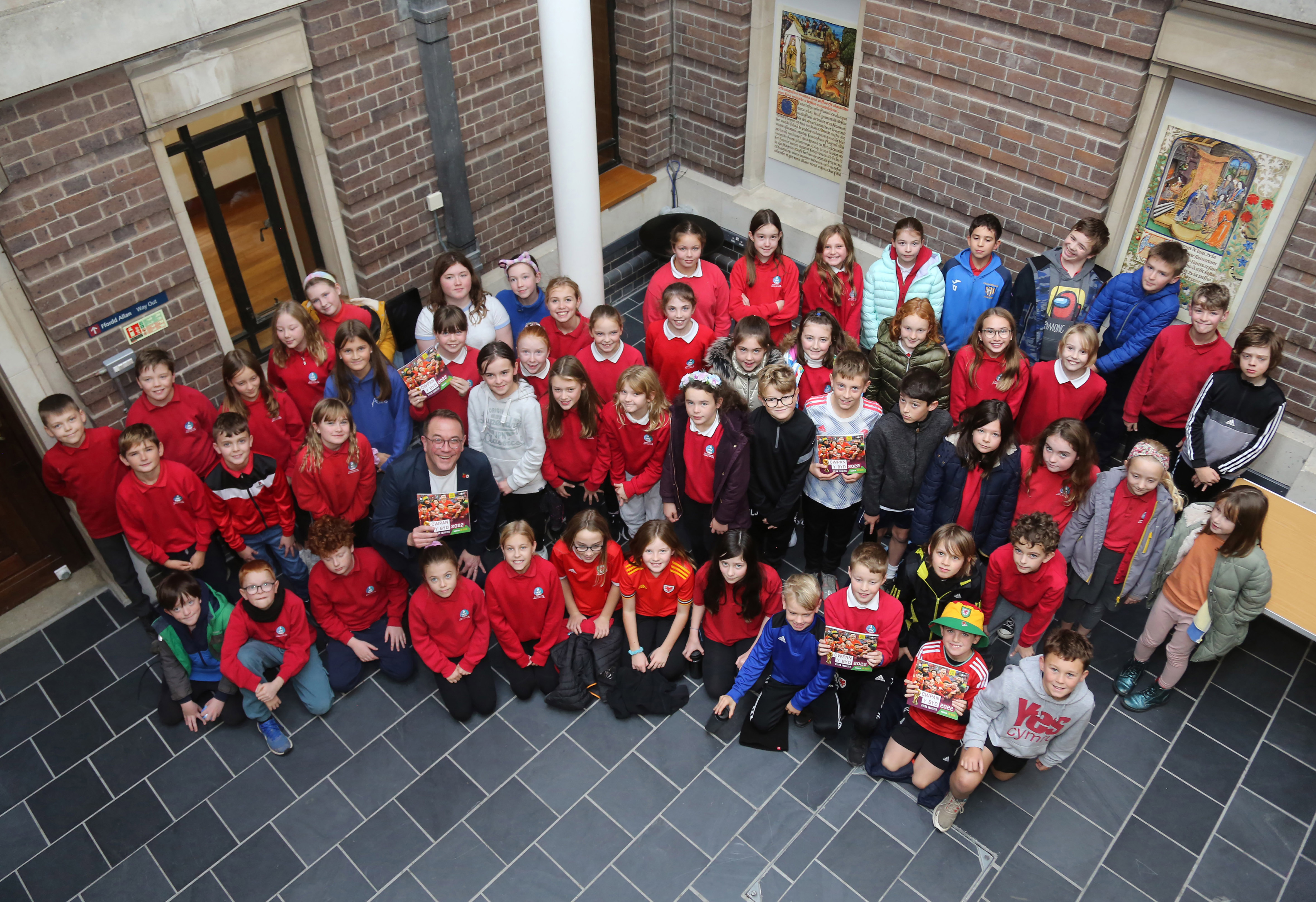 Dylan Ebenezer with pupils from Ysgol Cymraeg Aberystwyth