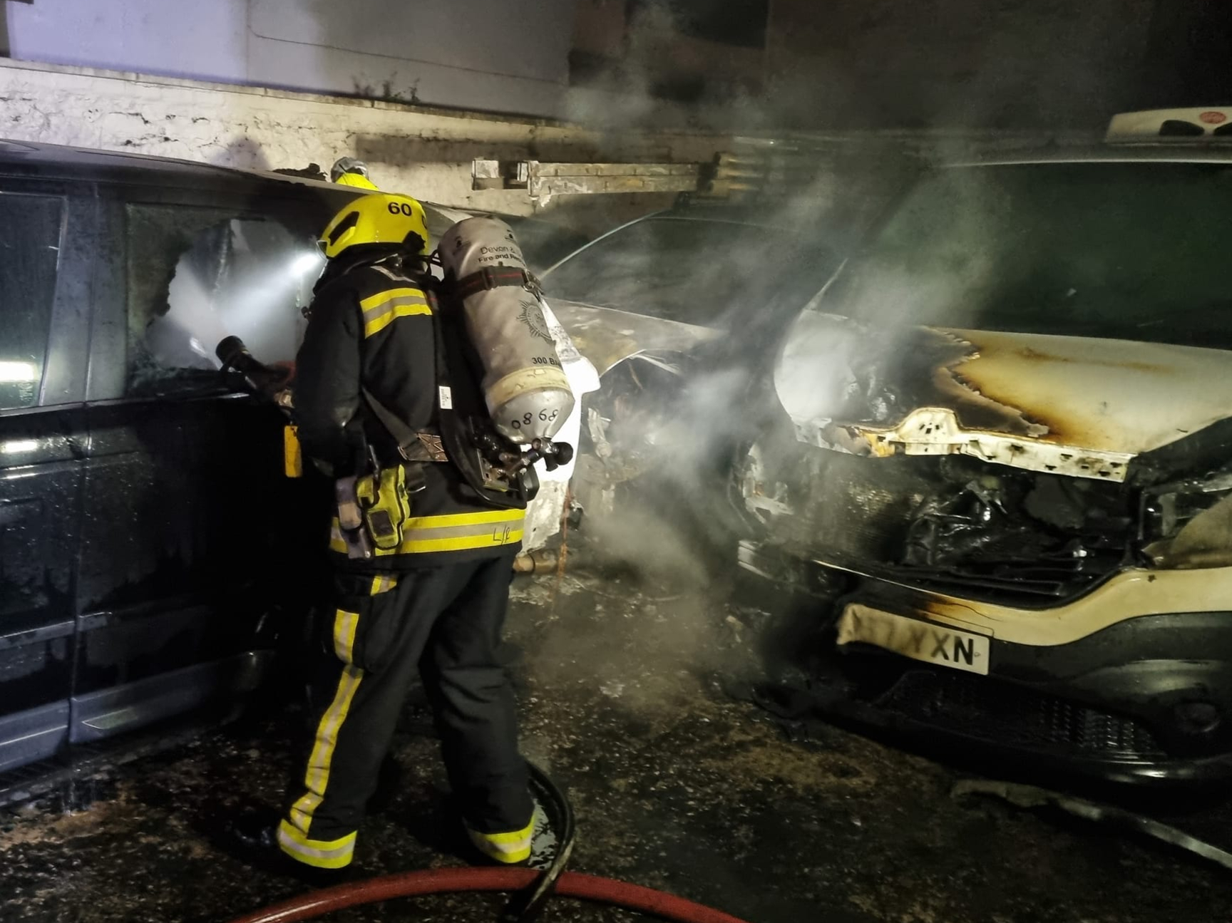 FIVE cars were burning when Newton Abbot Firefighters reached this site just off Queen Street. Picture: Newton Abbot Fire Station