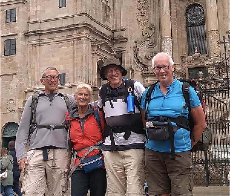 Neil Howell at the finish line with friends Martin, Anne and Julian