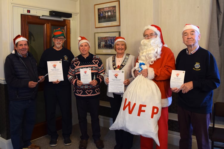 Haslemere mayor Jacquie Keen with members of the Farnham Lions