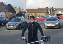 Mark braves the elements for 50-mile charity cycle