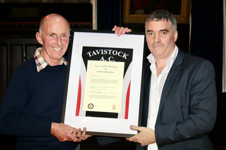 ABOVE: Bob Chapman receives a framed Tavistock Athletic Club vest to mark his honorary lifetime membership of the club. BELOW: Young athletes show their silverware from a successful club awards night.