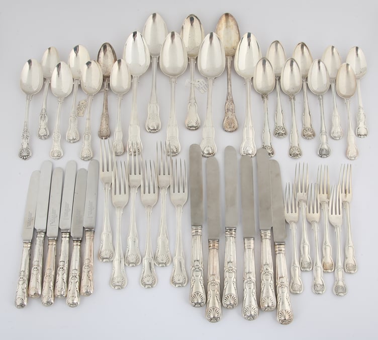 A composite collection of Kings pattern silver flatware, George III and later, comprising, six tablespoons, six table forks, six dessert forks, 15 dessert spoons, 12 knives in two sizes, weight excluding knives, 78.6oz (2447 grams) in a box. The estimate is £700-800