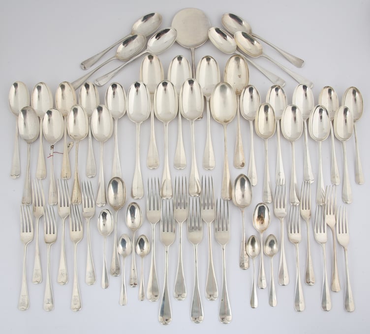 A composite rat tail silver service comprising, scoop, six large forks, 12 tablespoons, 26 dessert spoons, 12 dessert forks, seven teaspoons and six knives. The estimate is £800-1200