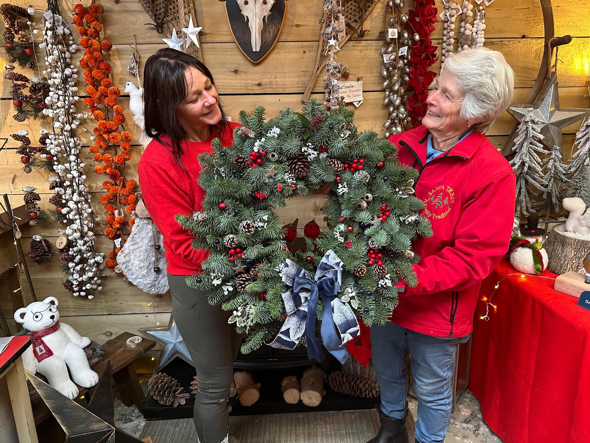 ABOVE: Helen and Margaret from Santa Tree’s with their Downing street wreath; Below, The Wreaths on their way to London