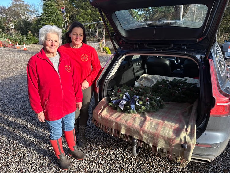 ABOVE: Helen and Margaret from Santa Tree’s with their Downing street wreath; Below, The Wreaths on their way to London