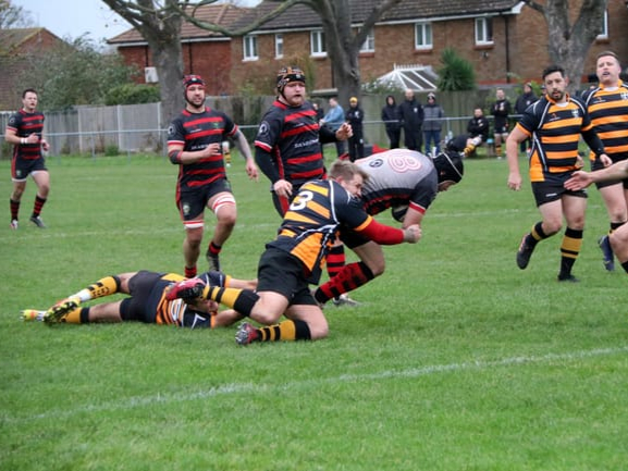 Luke Parratt’s run forward is halted