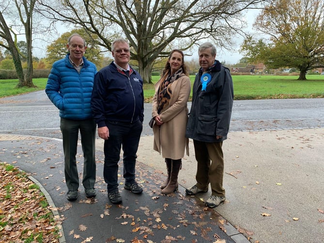 Ian Mitchell (second from left) was pictured campaigning with Tory Party activists last Thursday