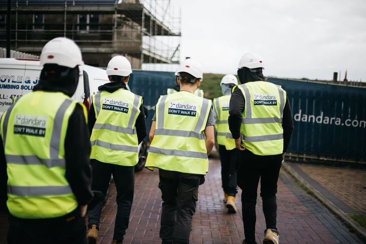 UCM Construction students touring Dandara’s Reayrt Mie site in Ballasalla