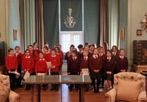 Three Dartmoor primary schools serenade Castle Drogo visitors