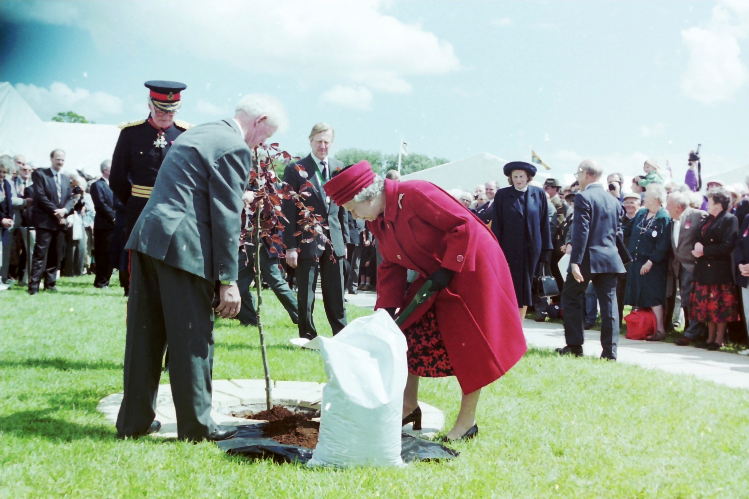 The Queen planting a tree at the Devon County Showground in May 1995. AQ 2860